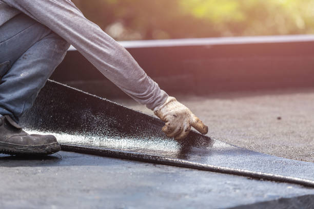 Professional Basement Waterproofing technician working in Waterford, WI